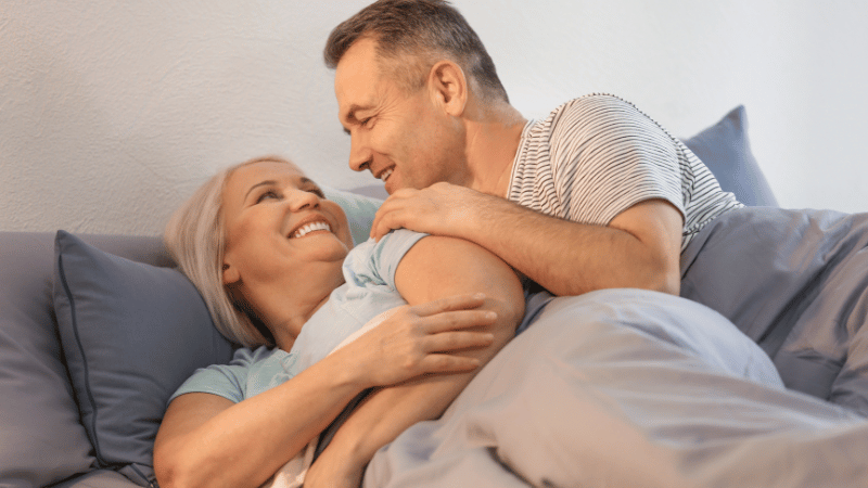 happy man and women happy in bed